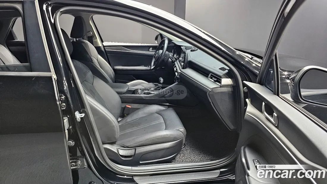 Kia Optima - фото 11