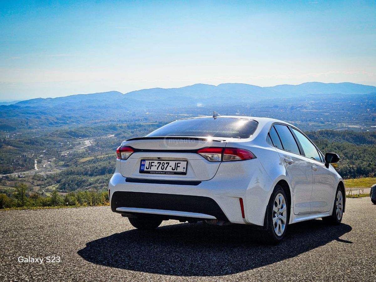 Toyota L 4dr Front-Wheel Drive Sedan — миниатюра 7