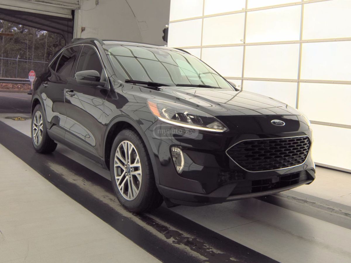 Ford Escape - фото 1