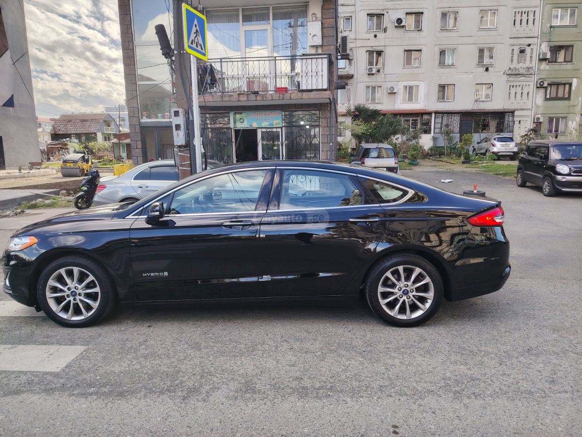 Ford Fusion - фото 7