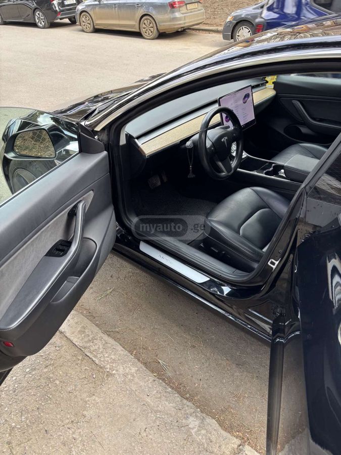 Tesla Model 3 - фото 13