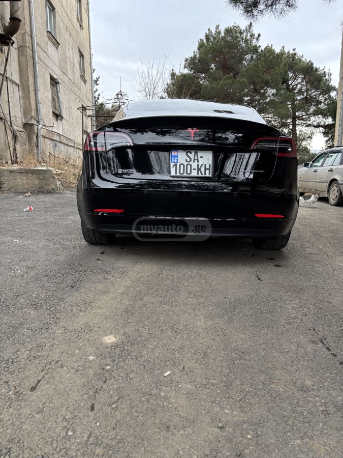 Tesla Model 3 - фото 5