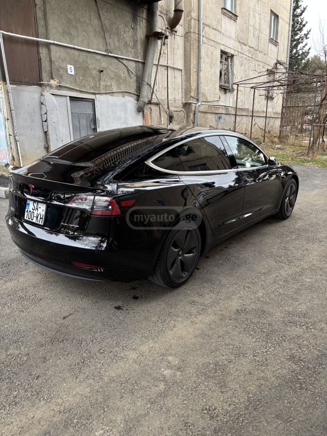 Tesla Model 3 - фото 7