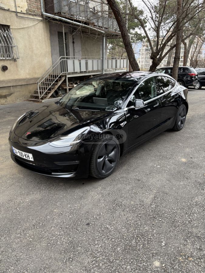 Tesla Model 3 - фото 8