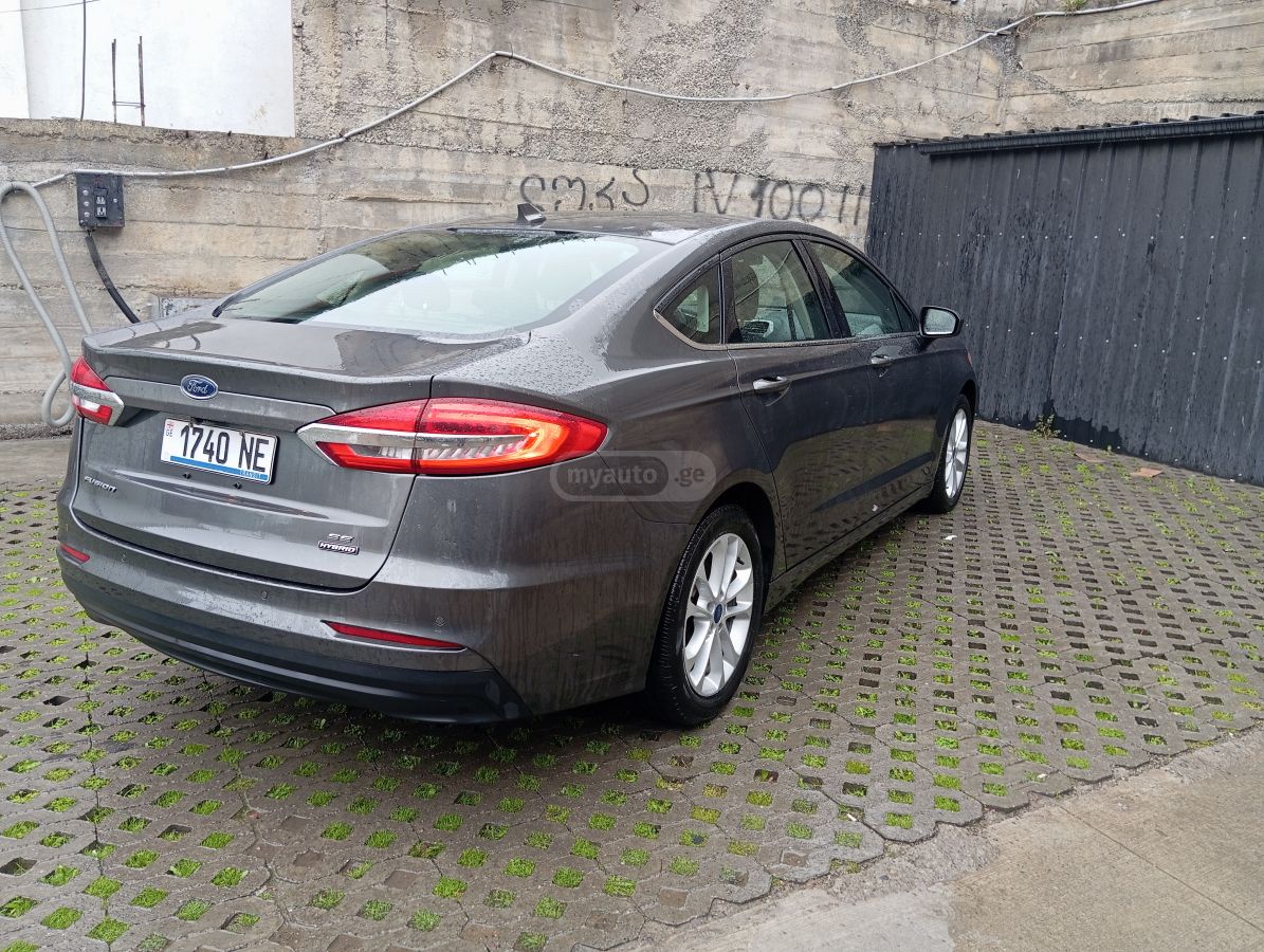 Ford Fusion - фото 5
