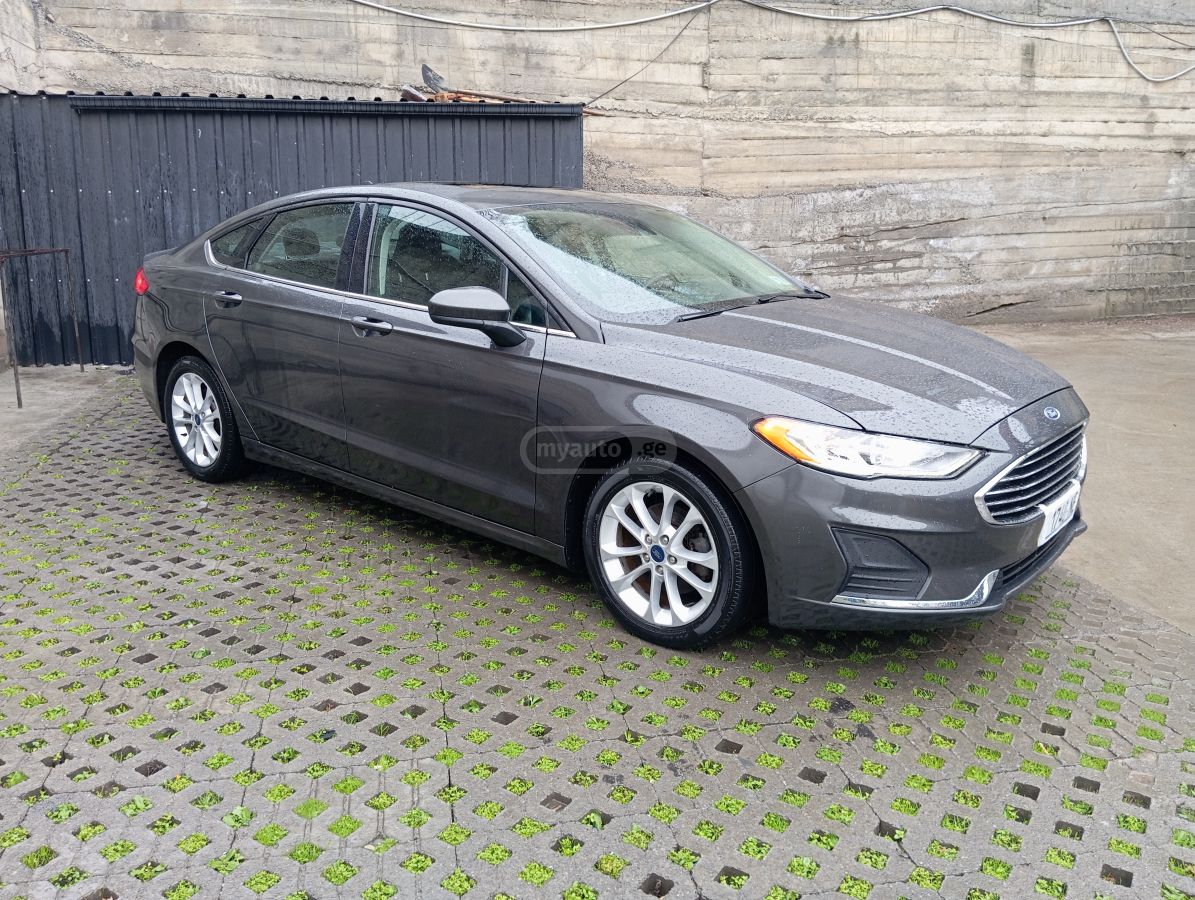 Ford Fusion - фото 7
