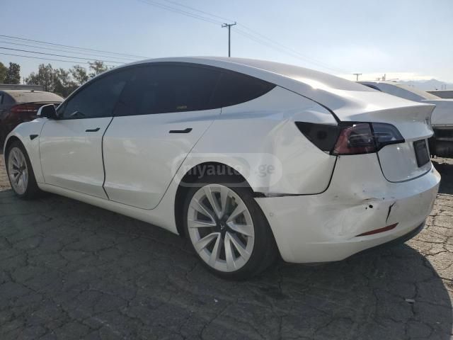 Tesla Model 3 - фото 12
