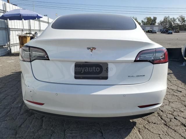 Tesla Model 3 - фото 8