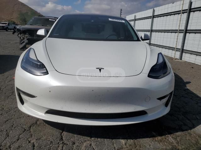 Tesla Model 3 - фото 9