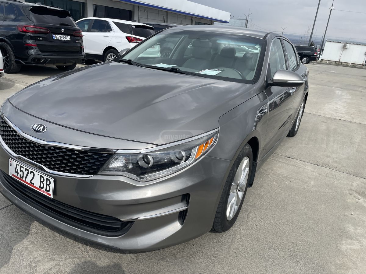 Kia Optima - фото 11