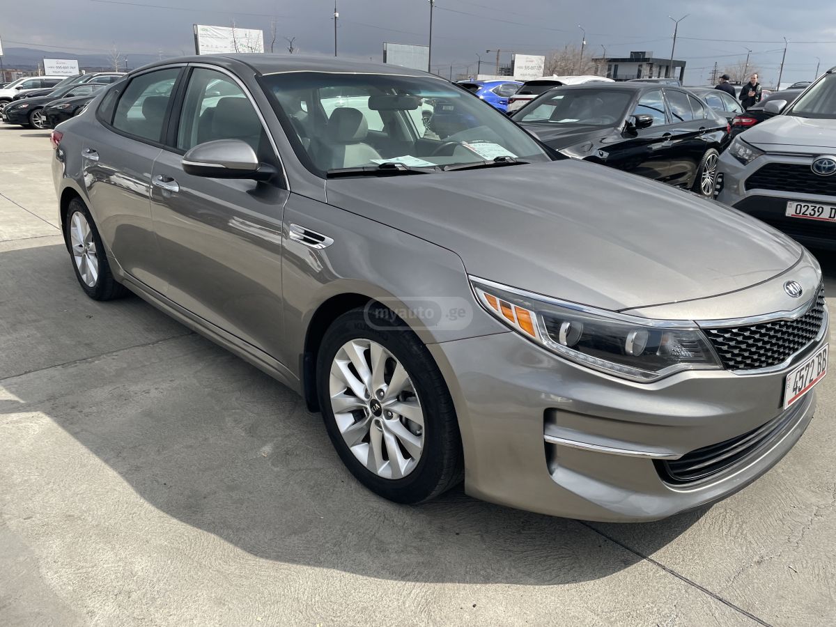 Kia Optima - фото 12