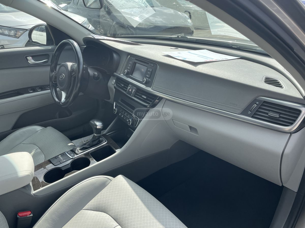 Kia Optima - фото 7