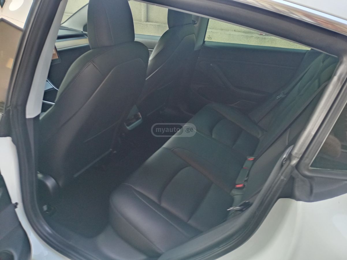 Tesla Model 3 - фото 7