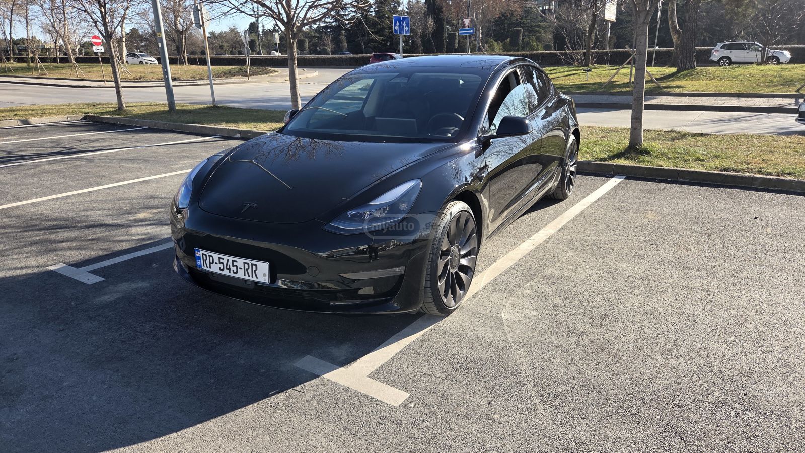 Tesla Model 3 - фото 1