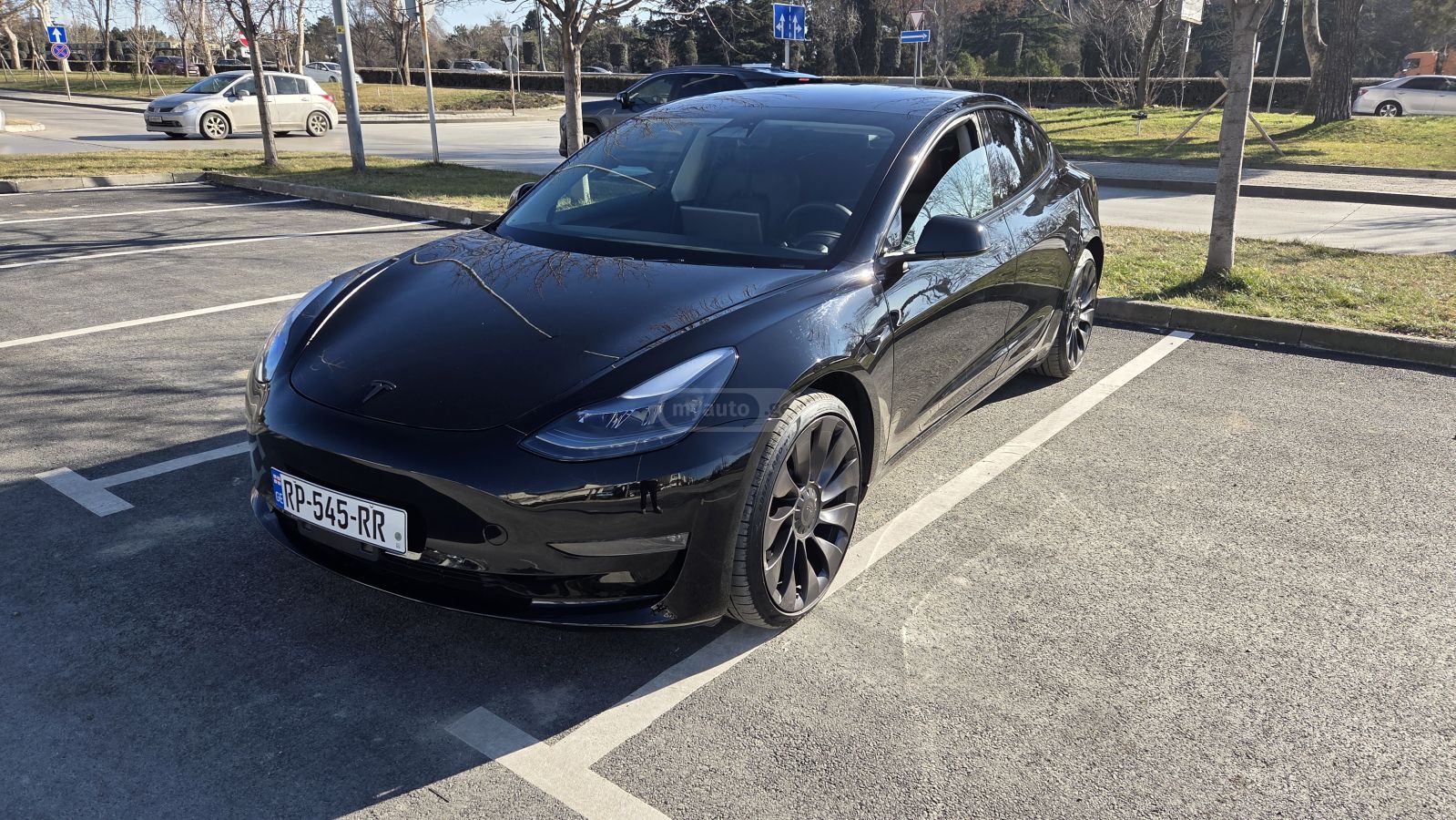 Tesla Model 3 - фото 13