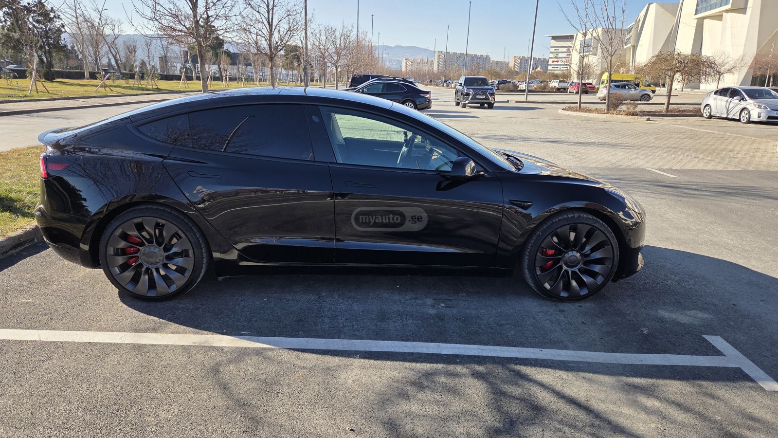 Tesla Model 3 - фото 6