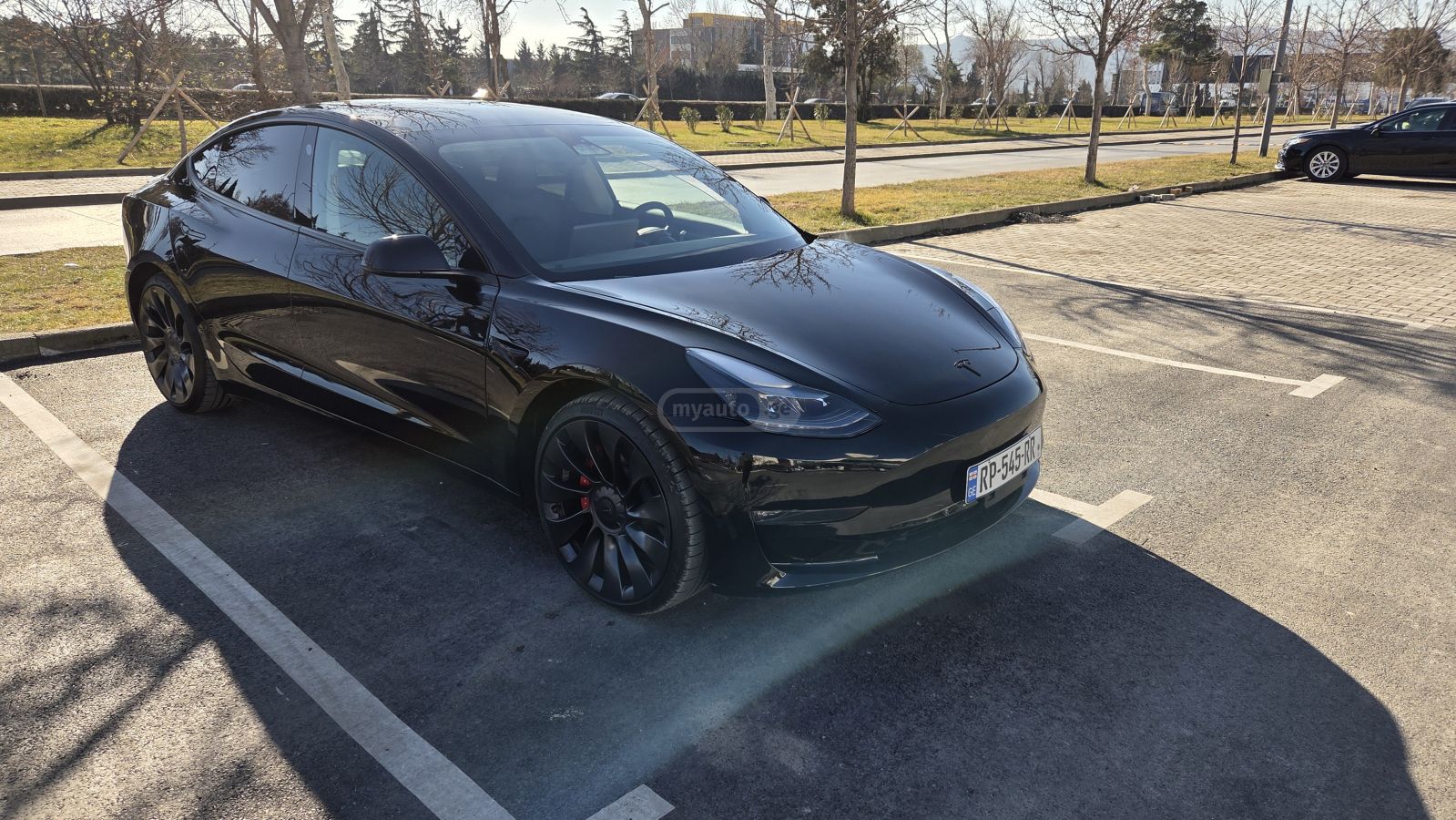 Tesla Model 3 - фото 7