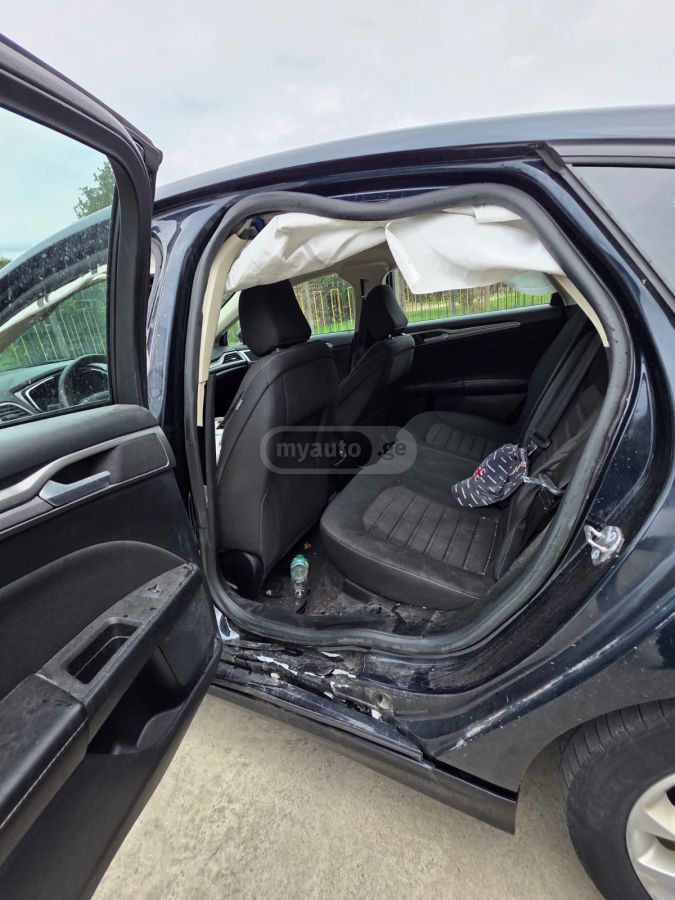 Ford Fusion - фото 9