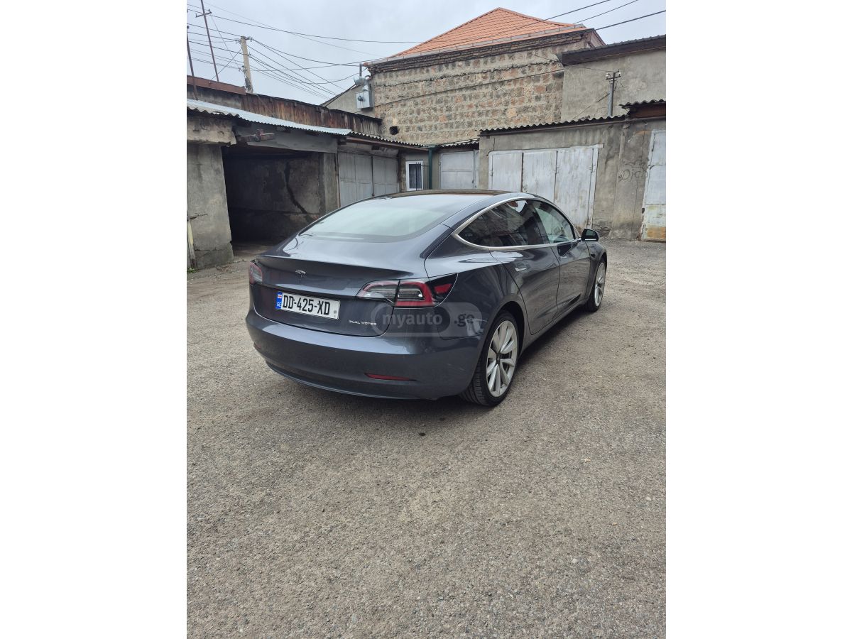 Tesla Model 3 - фото 12