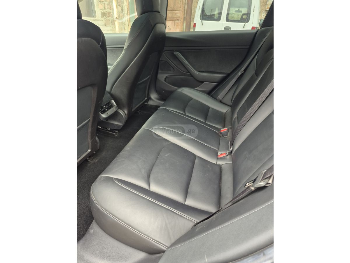 Tesla Model 3 - фото 5