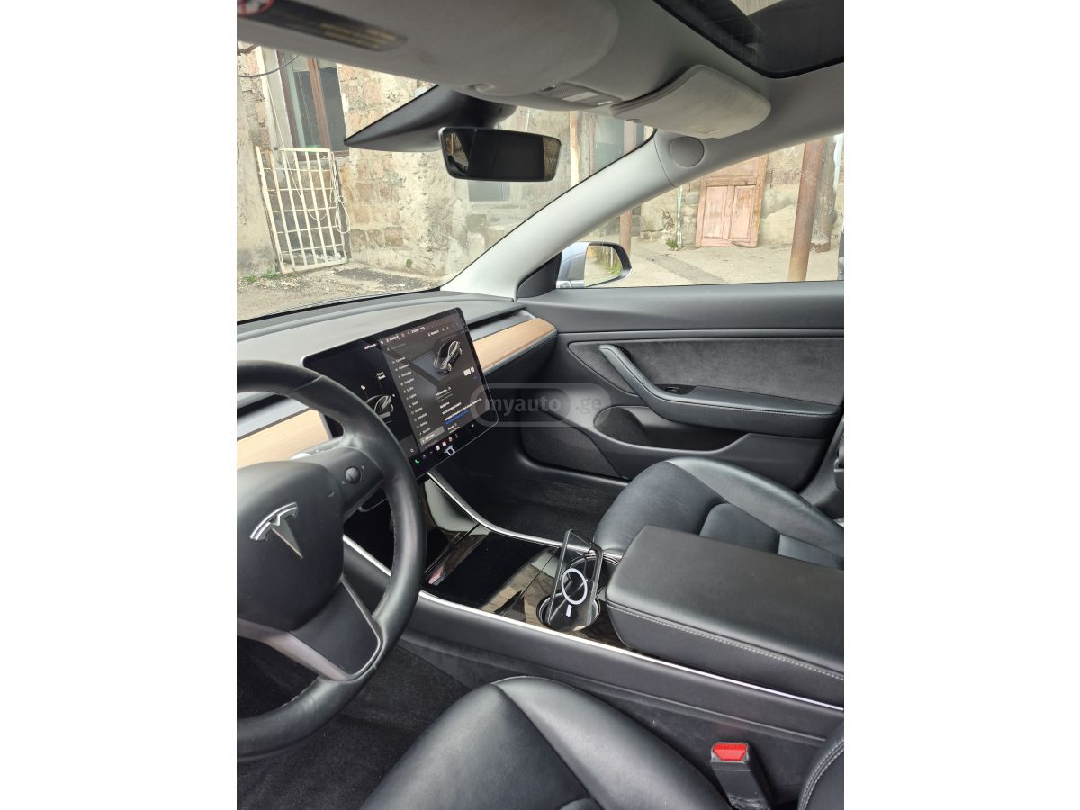 Tesla Model 3 - фото 6