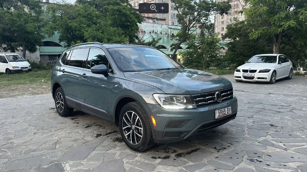 Volkswagen Tiguan - фото 1