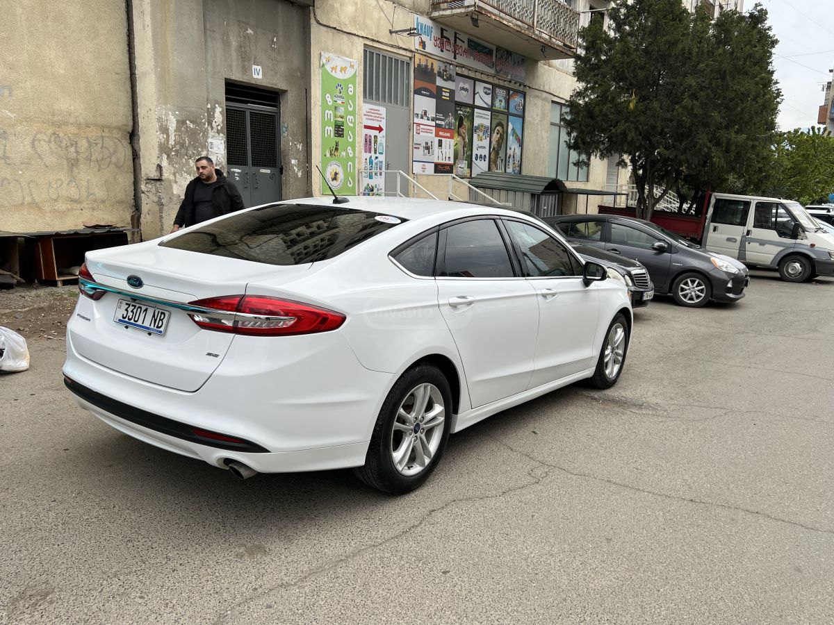 Ford Fusion - фото 7
