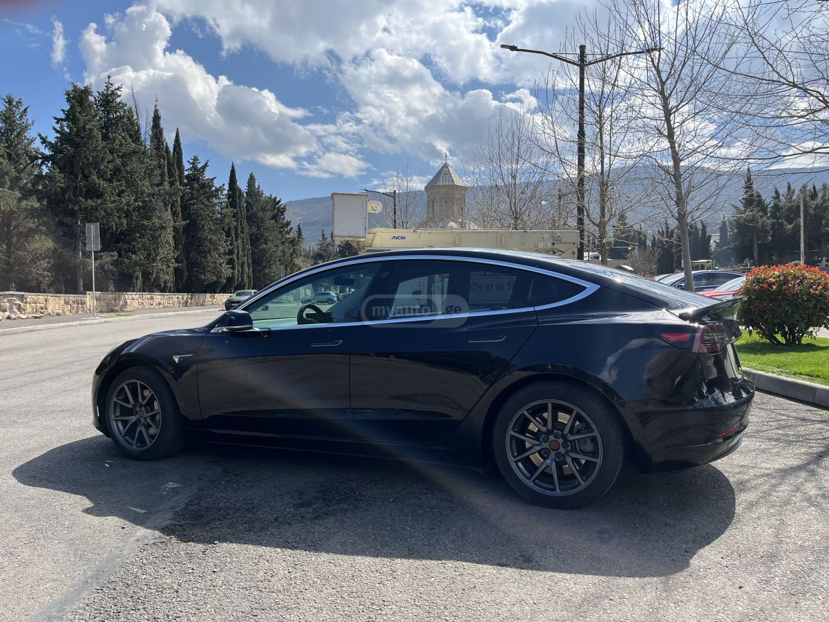 Tesla Model 3 - фото 5
