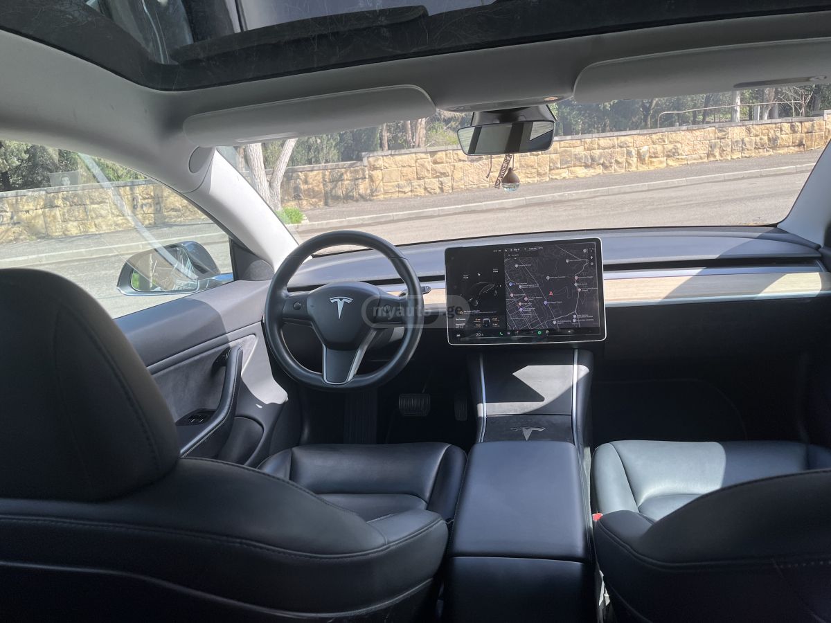 Tesla Model 3 - фото 8
