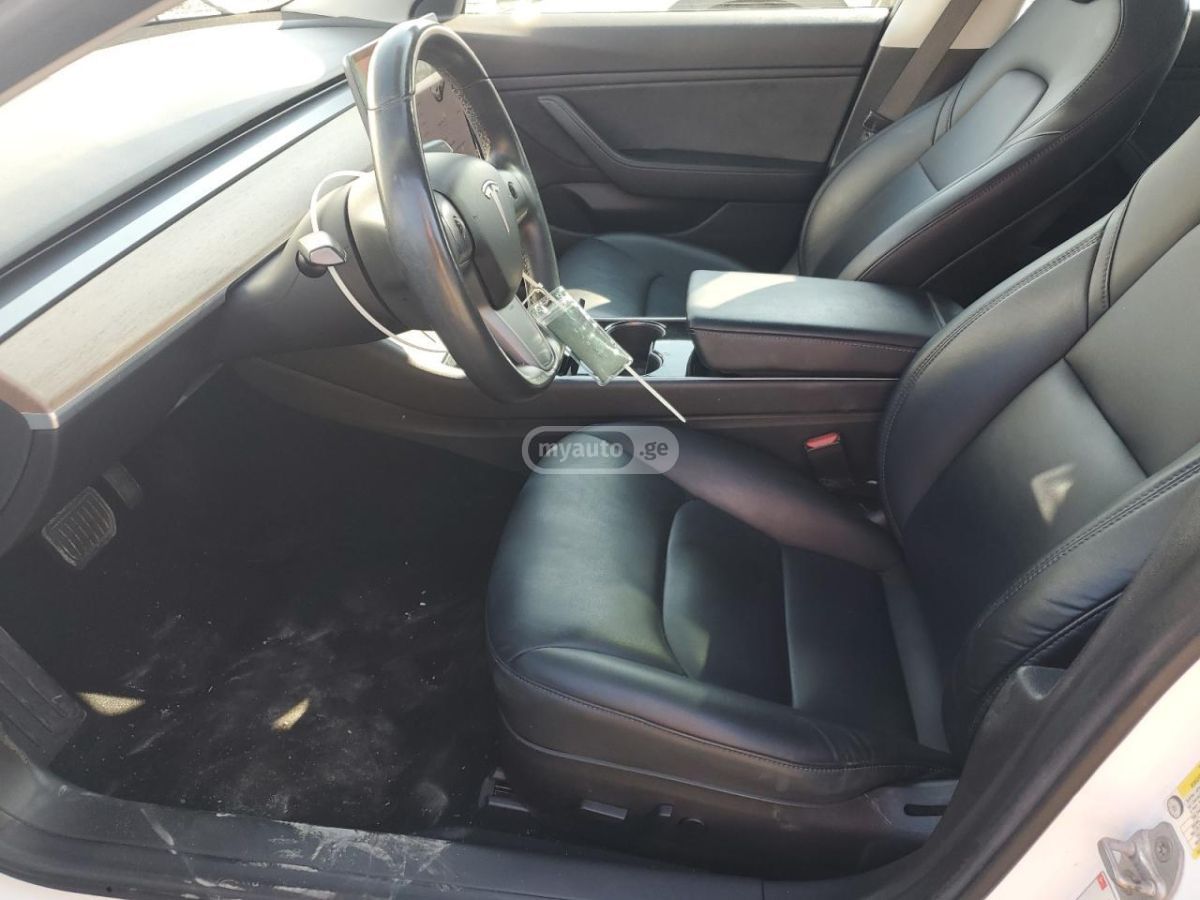 Tesla Model 3 - фото 7