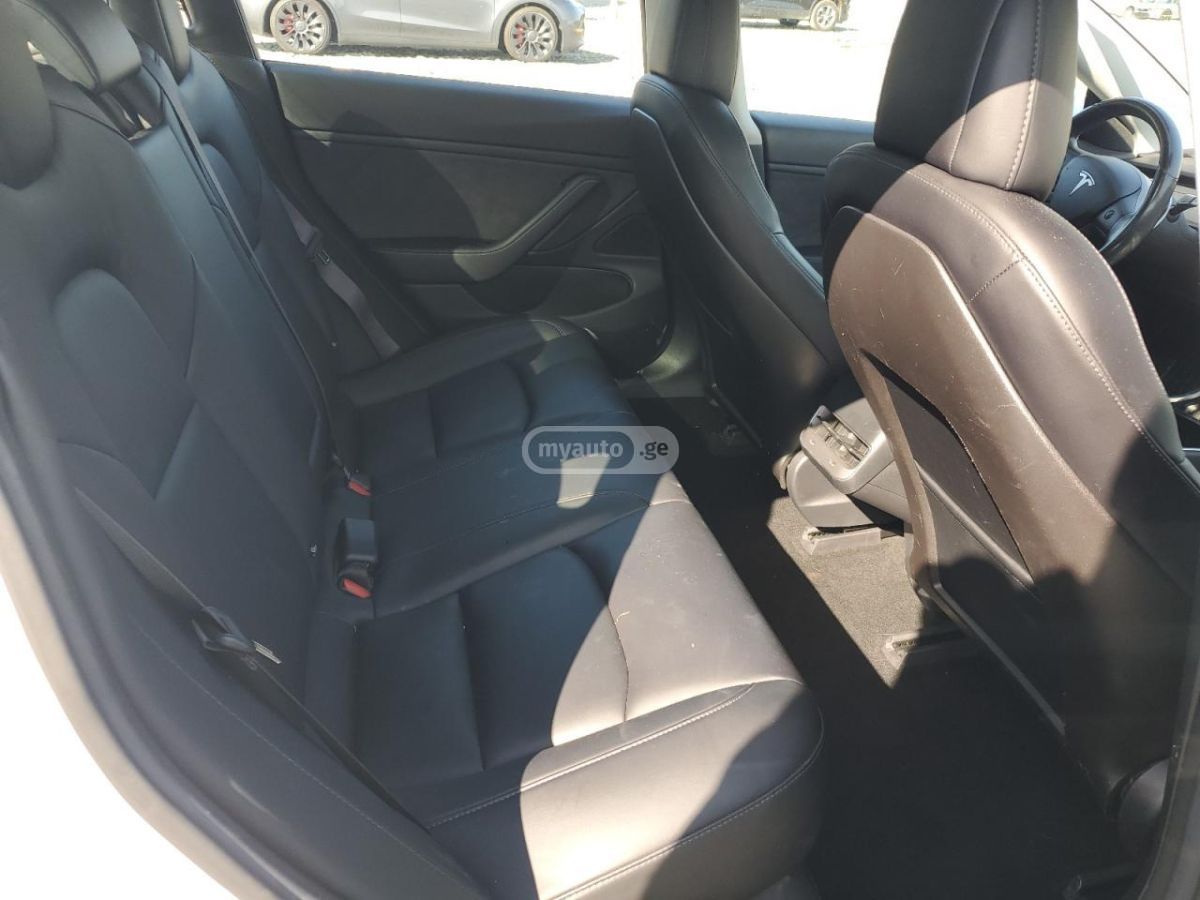 Tesla Model 3 - фото 9