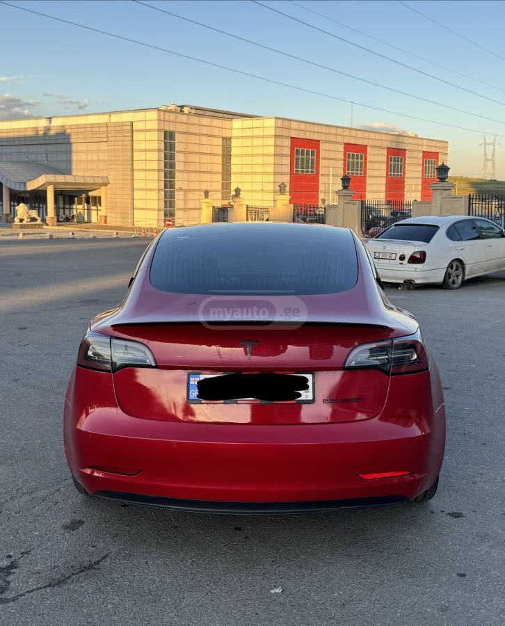 Tesla Model 3 - фото 7