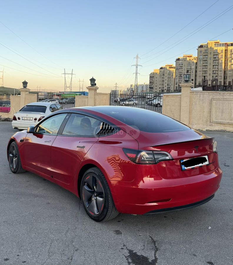 Tesla Model 3 - фото 8