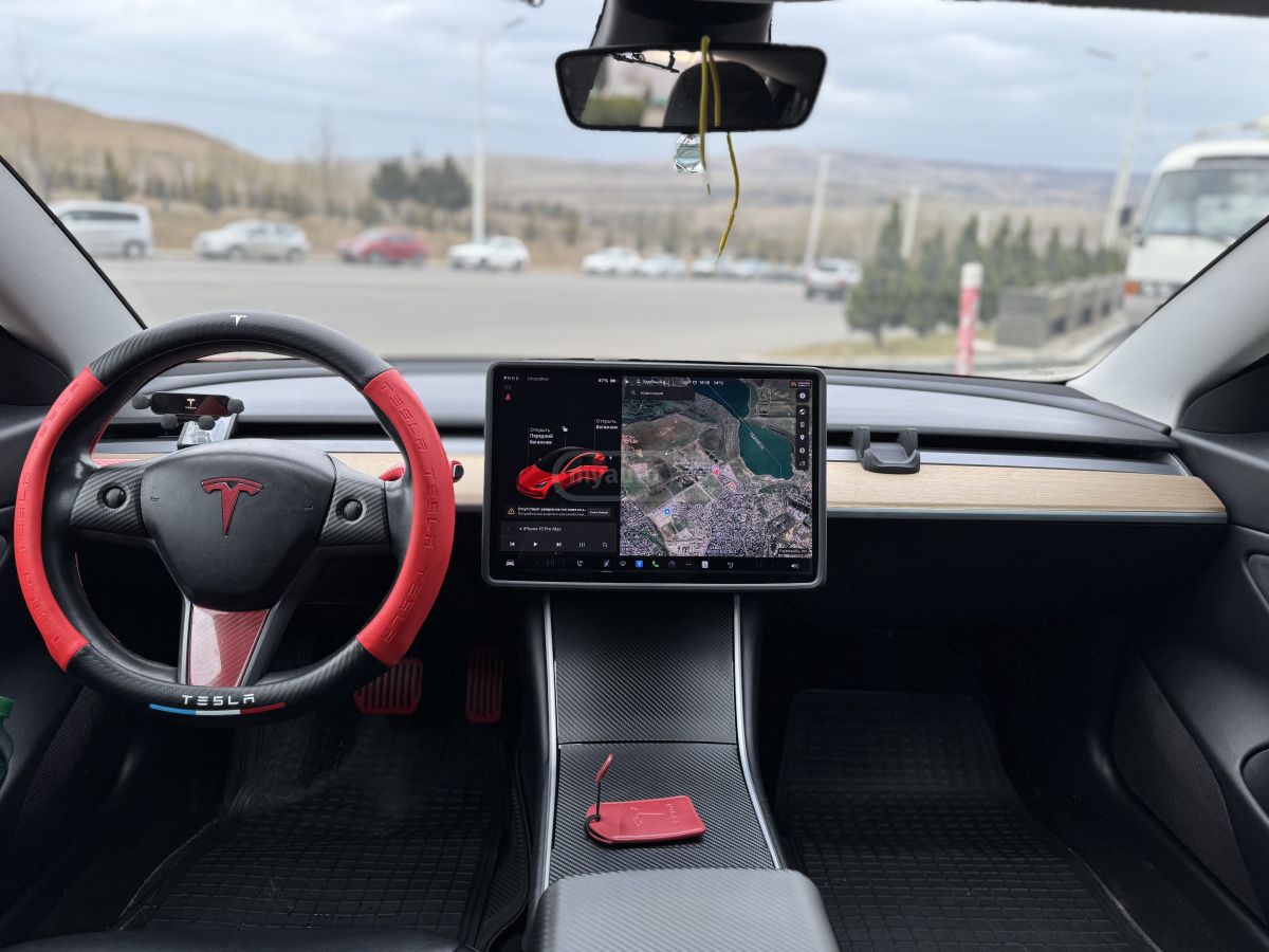 Tesla Model 3 - фото 9