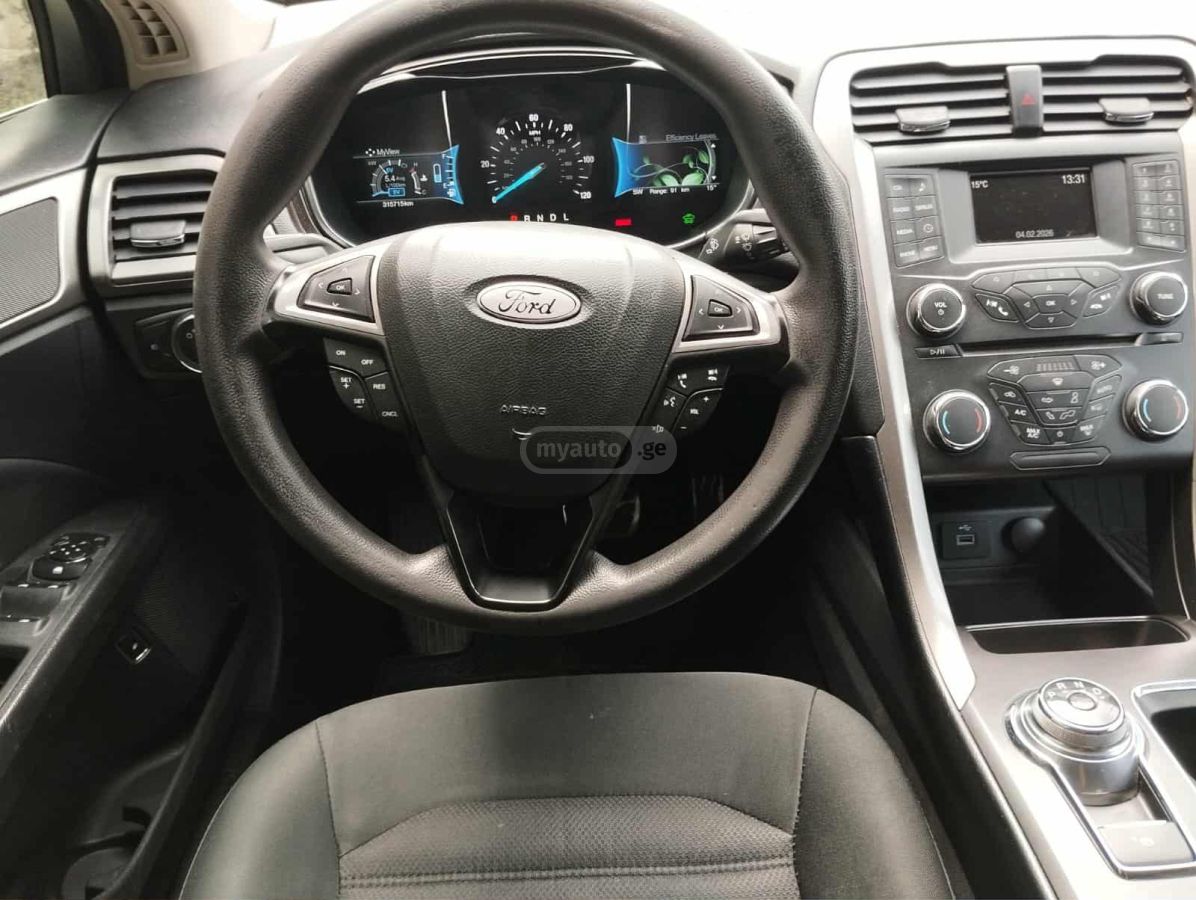 Ford Fusion - фото 11