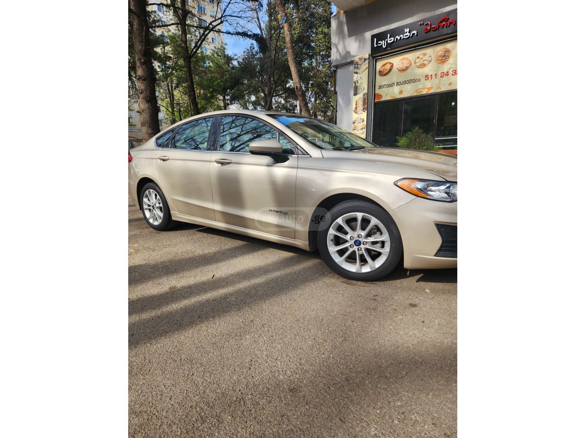 Ford Fusion - фото 10