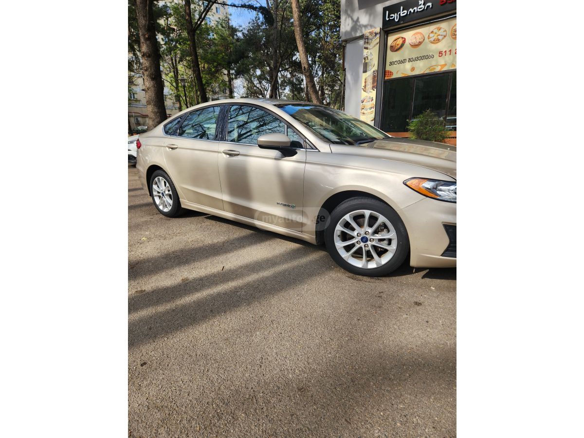 Ford Fusion - фото 11
