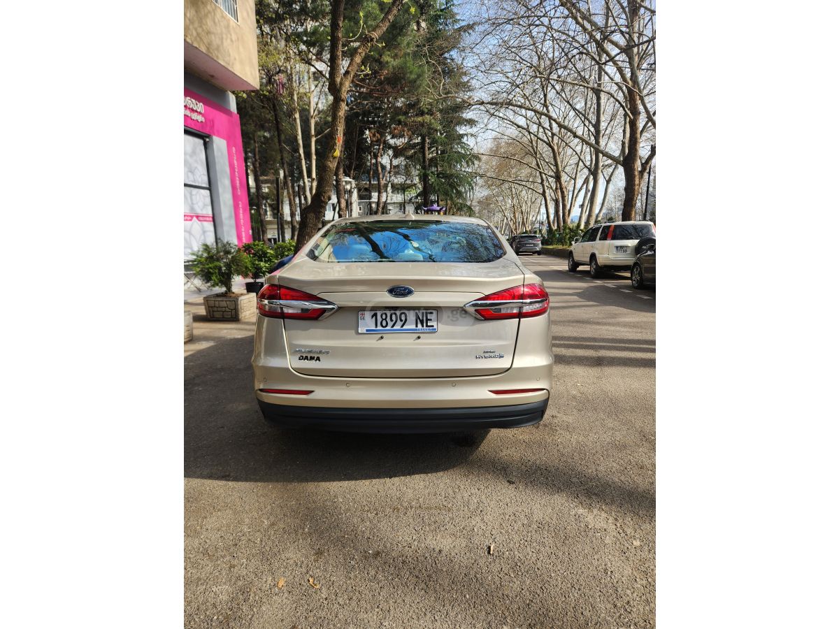 Ford Fusion - фото 7