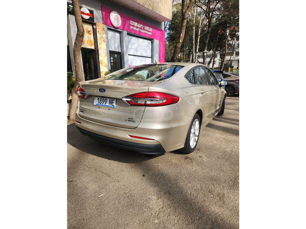 Ford Fusion - фото 8