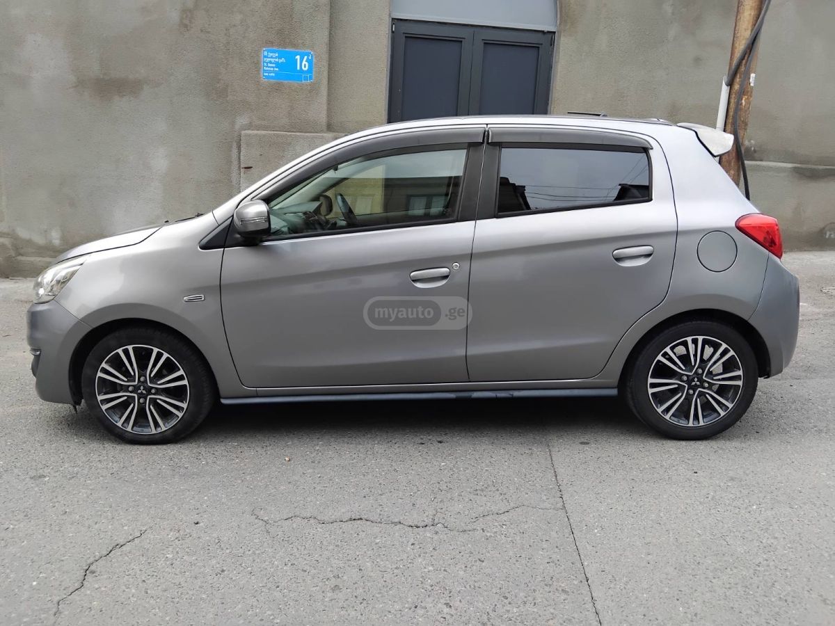 Mitsubishi Mirage - фото 5