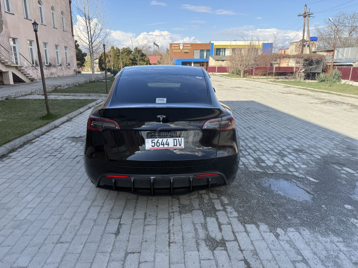Tesla Model Y - фото 4