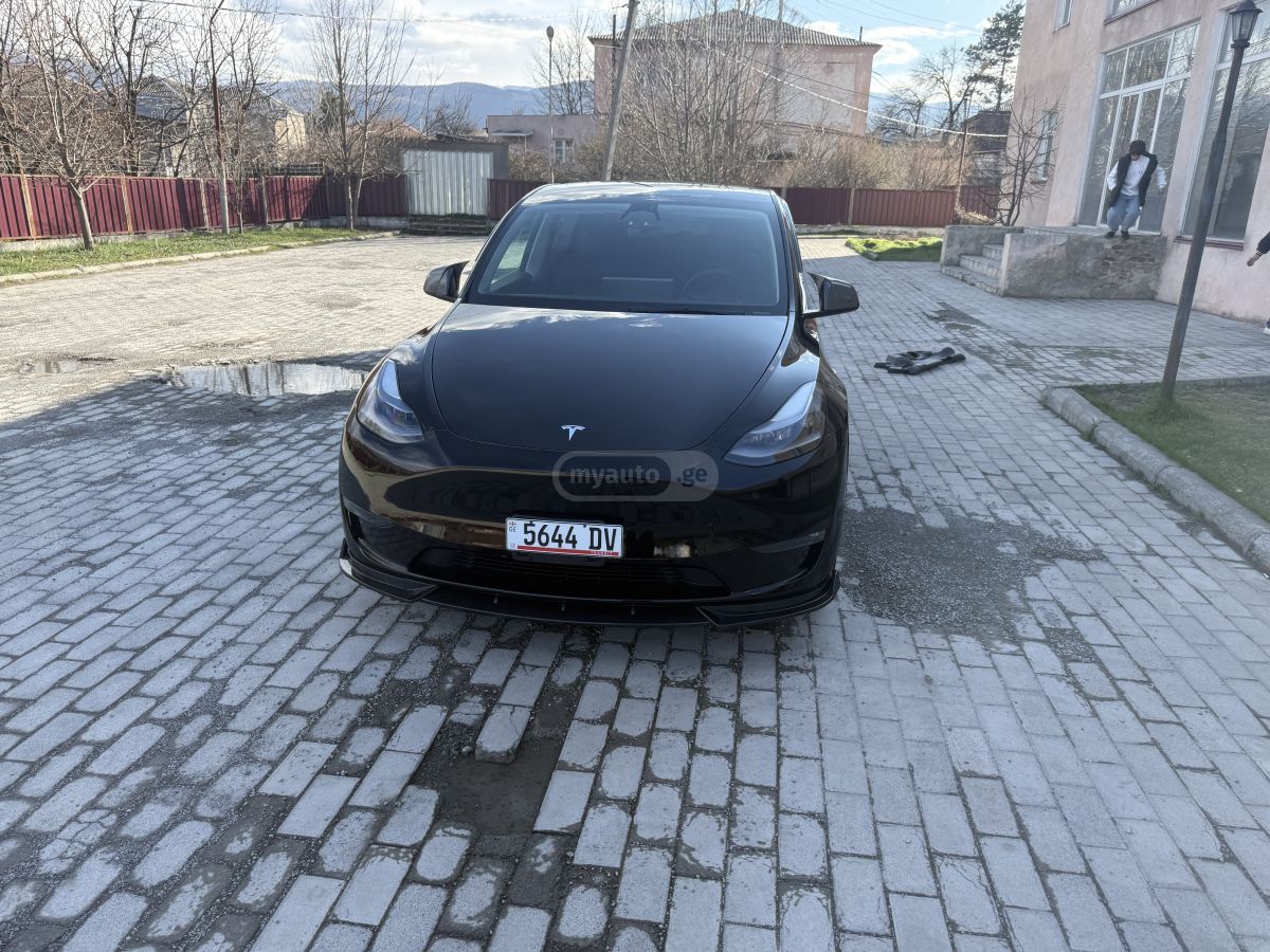 Tesla Model Y - фото 8