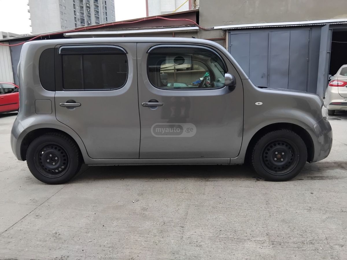 Nissan Cube - фото 1