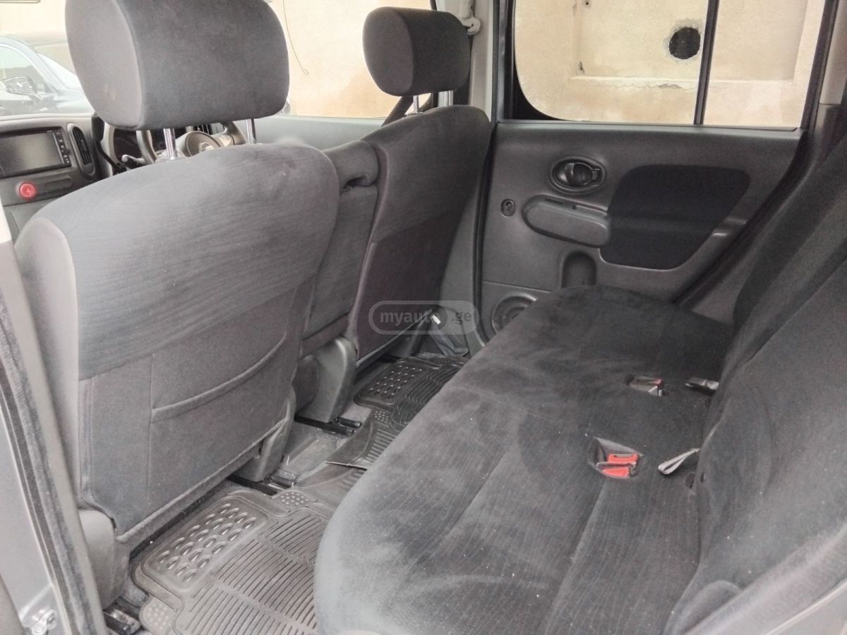 Nissan Cube - фото 11