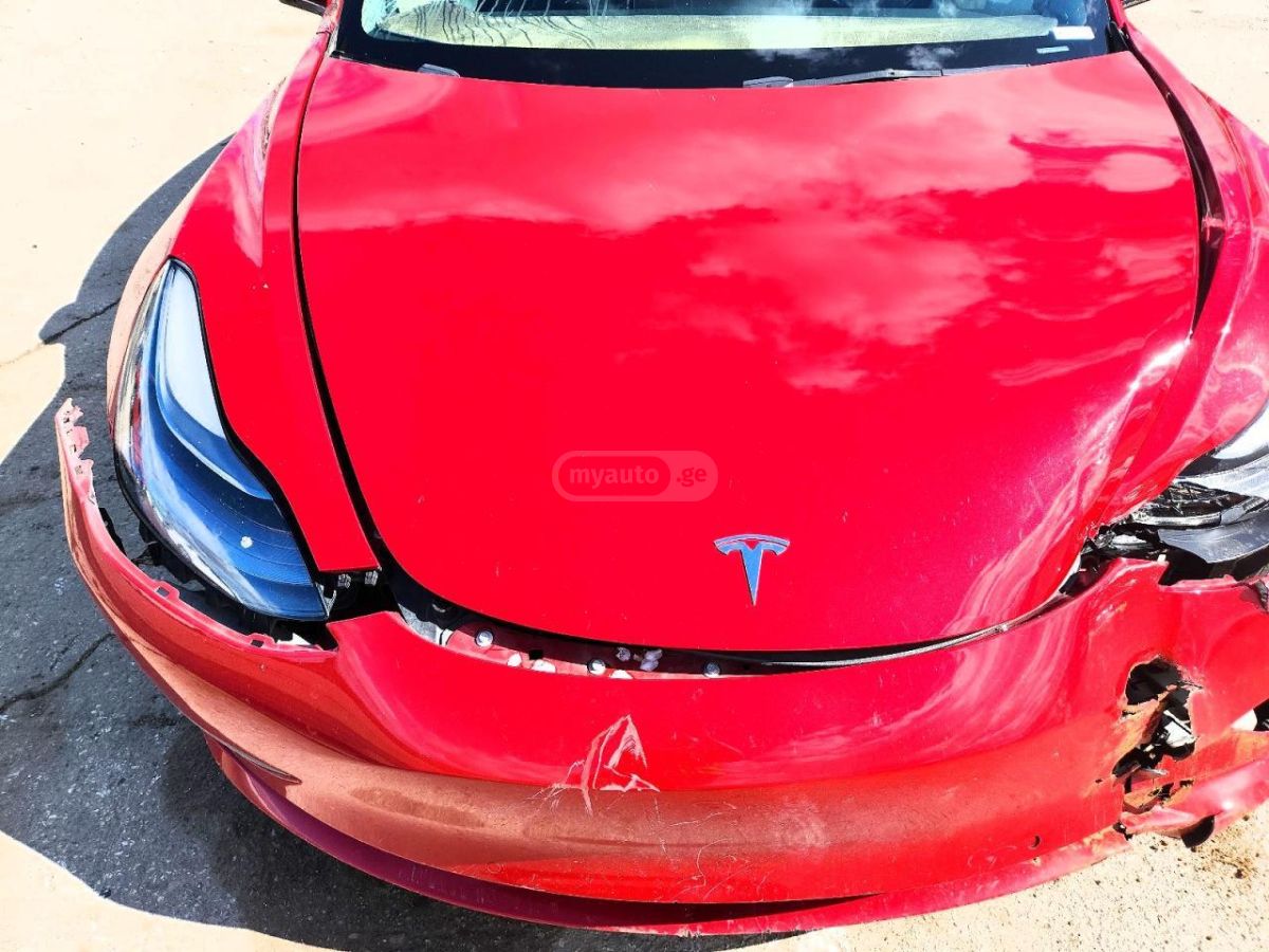 Tesla Model 3 - фото 11