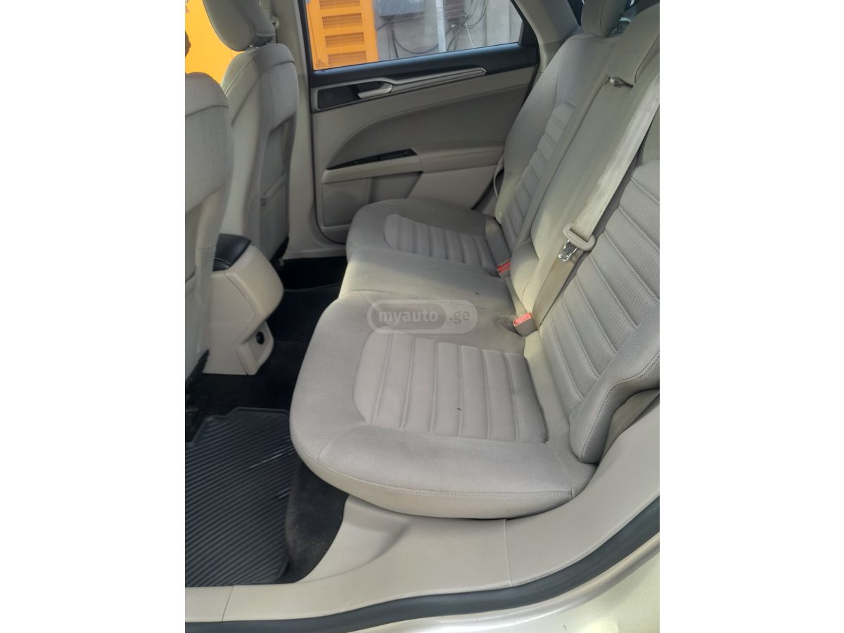 Ford Fusion - фото 7