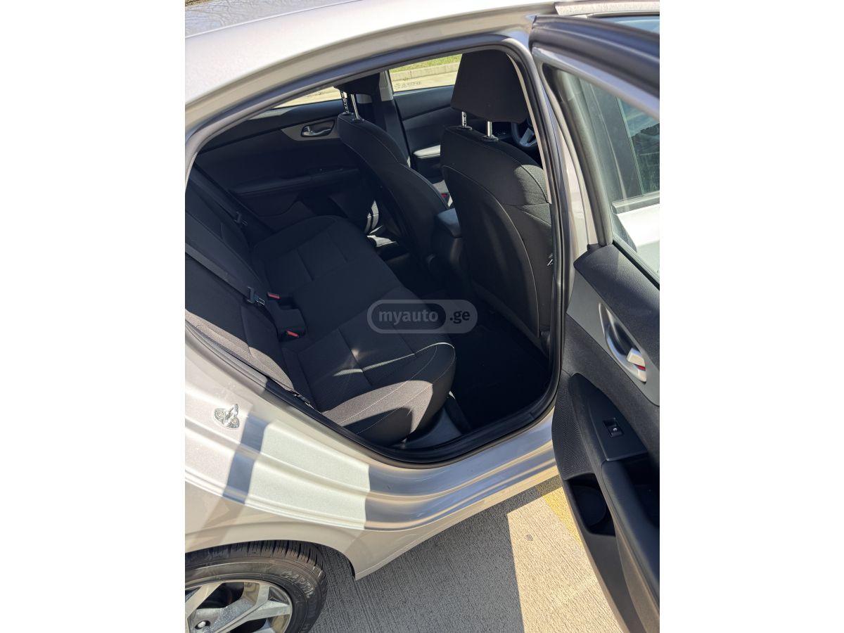 Kia Forte - фото 11