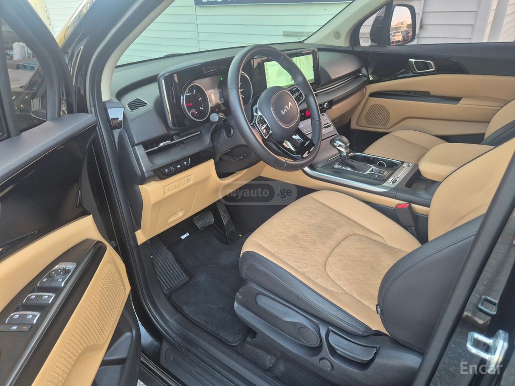 Kia Carnival - фото 6