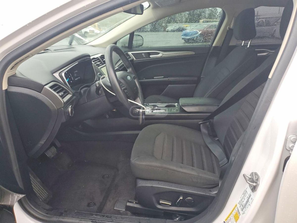 Ford Fusion - фото 7