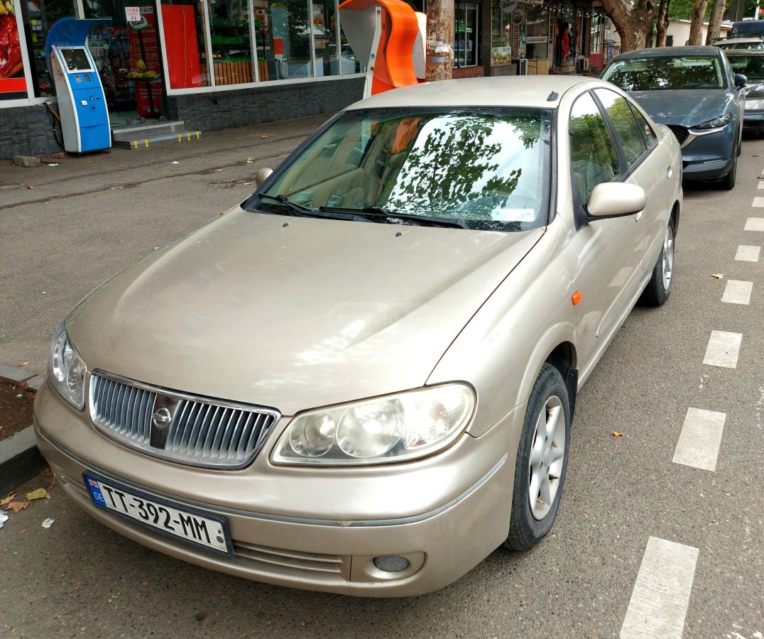Nissan Sunny - фото 1